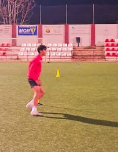 Leo playing soccer